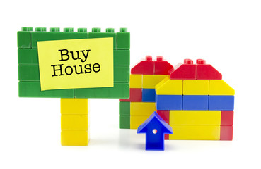 two home icon made from plastic building blocks and signage  iso