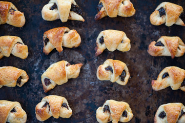 Small croissants on a metal tray