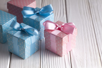 Colorful gift boxes on wooden table