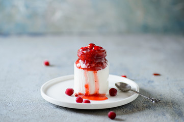 Cranberry with jam in whipped cream or yoghurt