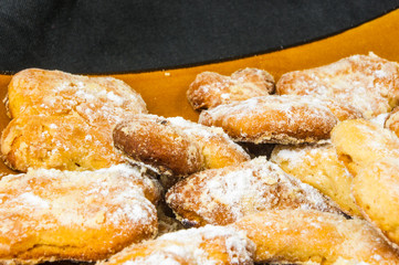 homemade cookies in powdered sugar