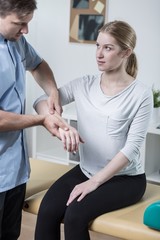 Fototapeta premium Physical therapist and patient