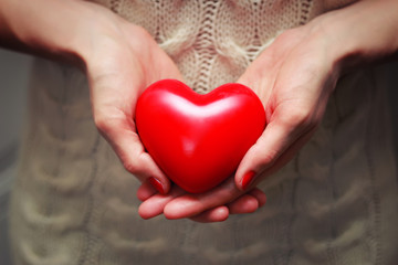 female hand valentine heart