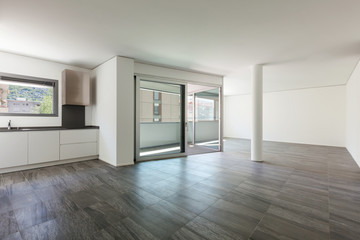 Interior, wide room with domestic kitchen