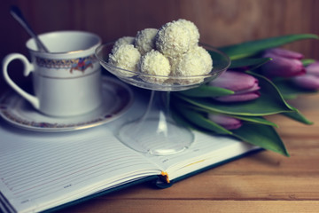 flower on the book and tea