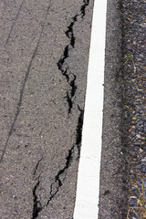Asphalt broken white line.