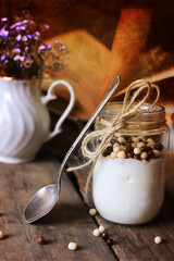 Obraz na płótnie Canvas retro effect photo rustic homemade yogurt jar