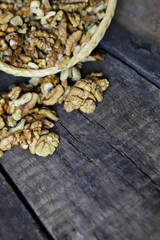 peeled walnut on a wooden background