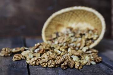 peeled walnut on a wooden background