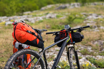 Bicycle with orange bags for travel