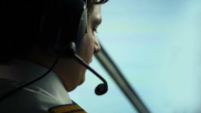 Professional civil aviation pilot passing flight information to air controller
