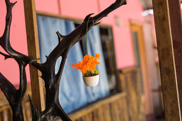 Fake flowers for interior decoration. Potted plants