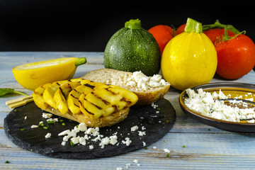 Making of healthy Vegetarian Veggie Sandwich with  Grilled yellow zucchini