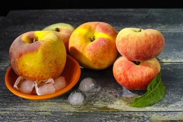 Fresh peaches and ice, hot summer concept