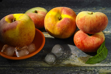 Fresh peaches and ice, hot summer concept
