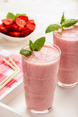 Healthy tasty milk cocktails with strawberries and banana.
