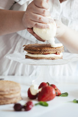 Woman Making The Naked Cake