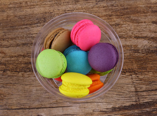 Tasty macaron isolate on wood