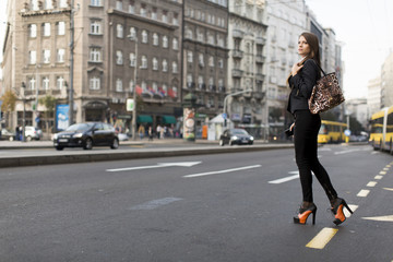 Woman crossing the street