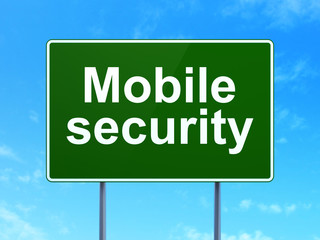 Protection concept: Mobile Security on road sign background