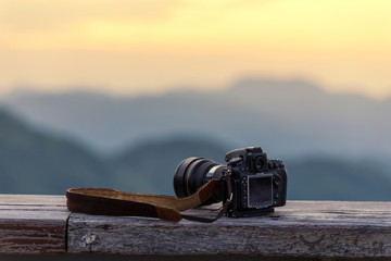 Travel photographer equipment with beautiful landscape on the ba