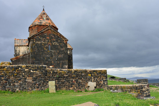 Shrine of the Armenian people. Temple on Lake Sevan. Thunder Sky