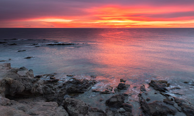 Obraz premium Sunrise on the coast of Escullos. Natural Park Cabo de Gata. Spain.