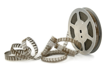 Naklejka premium Old cinefilm isolated on white