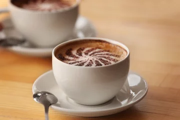 Fotobehang Two cups of coffee with foam, closeup © Africa Studio