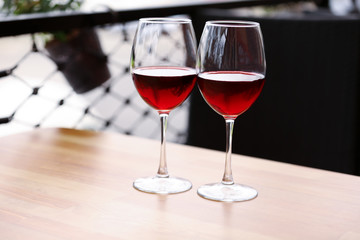 Two glasses of wine on the table