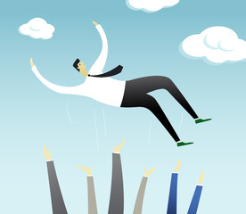 Successful businessman is thrown into the air by colleagues after successful business achievement. Happy successful businessman enjoying his triumph. Bright sunny day celebrates his victory.