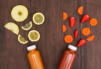 Detox drinks on wooden background