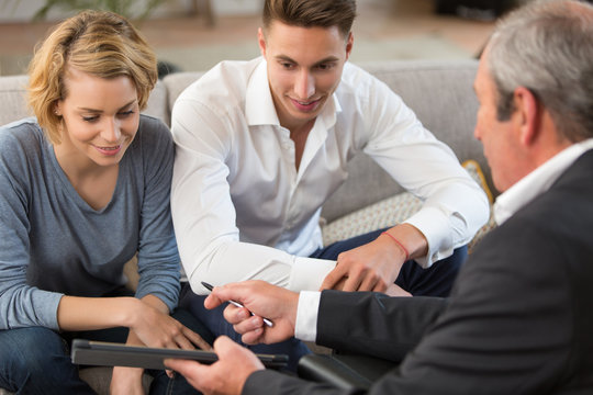 couple meeting financial adviser for investment