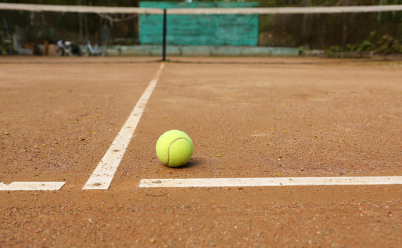 Tennis ball on tennis court