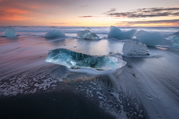 Icebergs on the black sand volcanic beach,  Vatnajokull Glacier, Iceland.