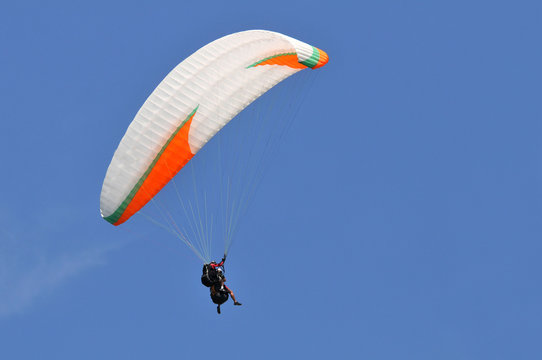 Parachute flying over a blue sky