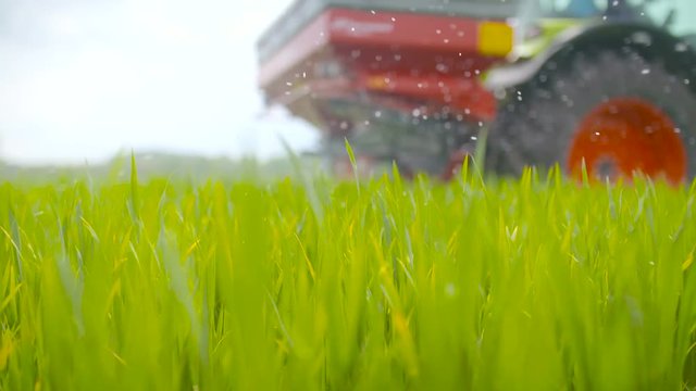 Tractors sprayed with fertilizer