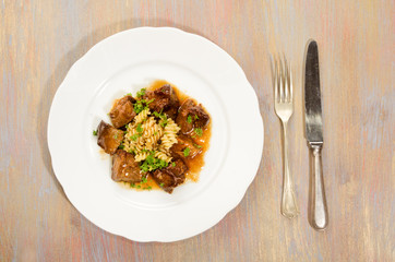 beef goulash with pasta and parsley