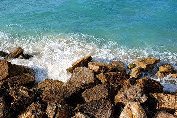 Fototapeta na wymiar Sea beach with big rocks