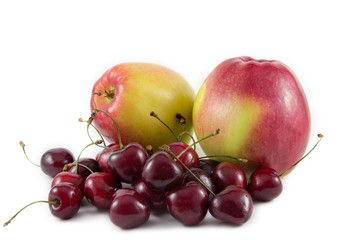 Red fresh cherries and apples