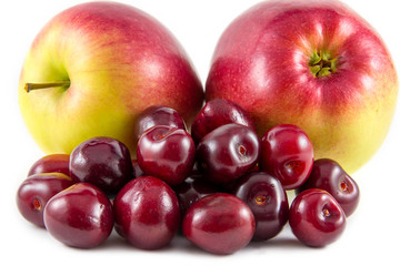 Red fresh cherries and apples