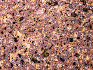 Stone texture of warm colours.