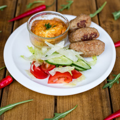 cutlets with salad , food top view