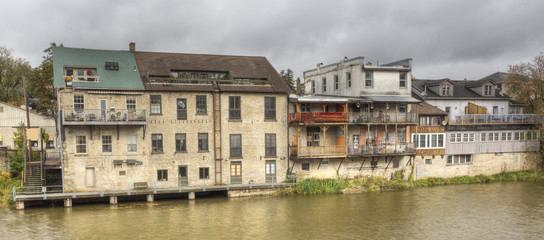 Stores along the riverfront in Elora, Canada