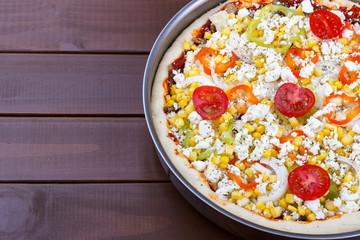 Uncooked homemade pizza