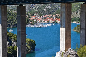 View of a harbor from under the bridge
