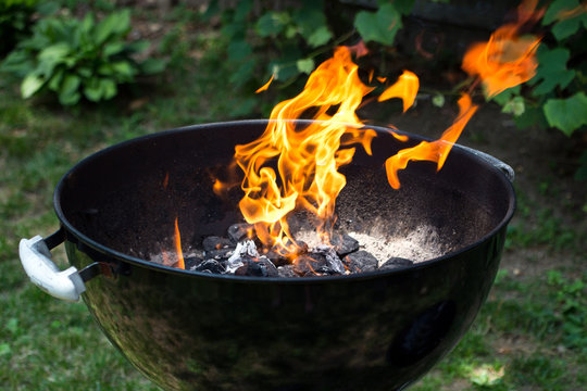 Flames and coals in barbecue