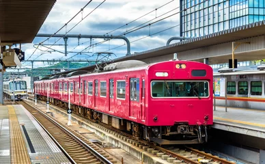 Fotobehang Local train at Himeji station, Japan © Leonid Andronov