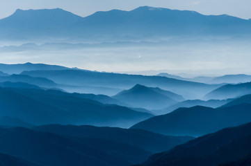 Elevated view of stunning misty mountain scenery
