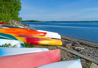 Kayaks and canoes on beach at Northport Maine
